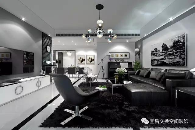 客廳設計  黑色地毯搭配黑色皮質沙發，搭配現代化的吊燈，展現出后現代風格在追求現代化潮流的同時，將傳統的典雅和現代的新穎相融合，創造出融合時尚與典雅的獨特設計。